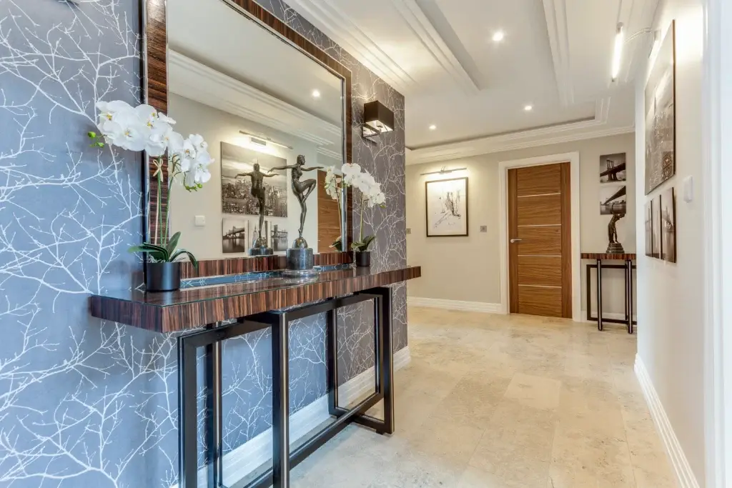 Handmade hallway console with mirror and sculpture, part of a bespoke Worthing interior by Downland & Scullery.
